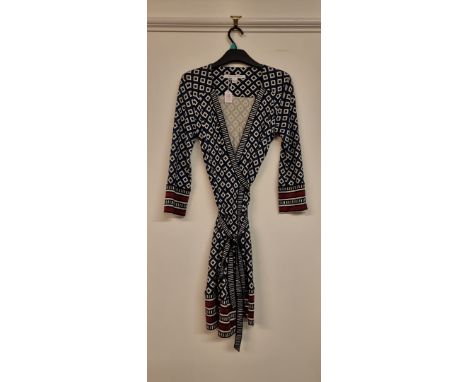 Diane Von Furstenburg:&nbsp;a 'Tallulah' pattern knee length wrap dress, UK 8; together with a Hugo Boss mink silk short slee
