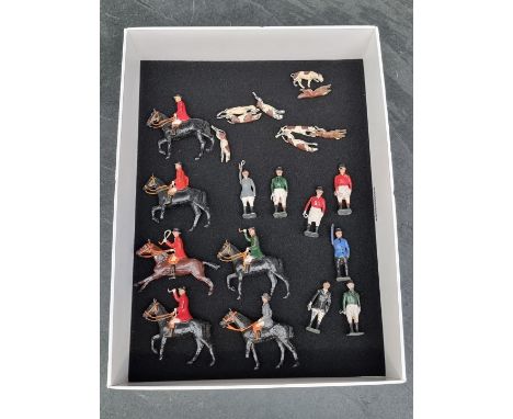 Britains:&nbsp;a vintage lead fox hunting group comprising: 6 mounted figures; 7 standing huntsmen and women; 7 dogs and two 