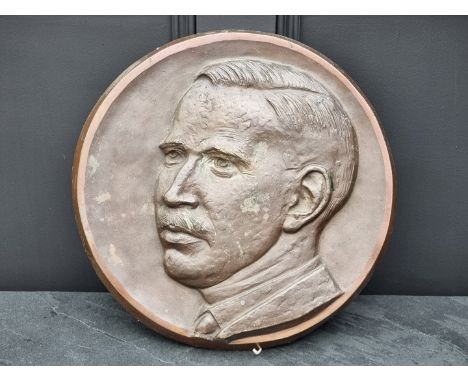 A bronze relief portrait plaque, 38.5cm diameter.
