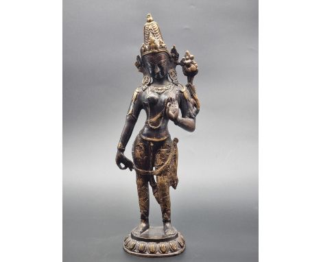 An Eastern bronze figure of Tara, 41cm high.