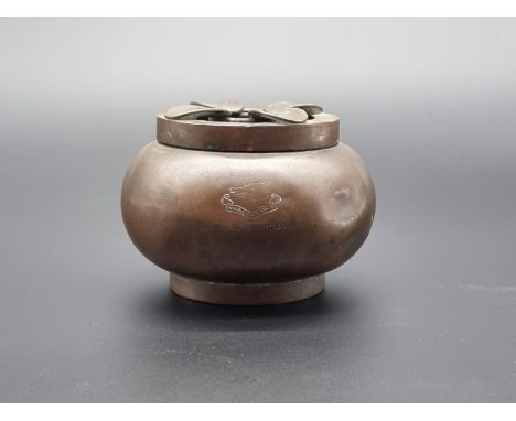 Of WWII Nautical interest: a copper ashtray and cover, inscribed 'H.M.S Grimsby, Presented to L/C A Howell, Tientsin, North C