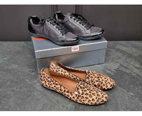Prada:&nbsp;a pair of Prada Sport black leather and nylon trainers, EU 37, with dust bag, waterproof storage bag, in box; tog