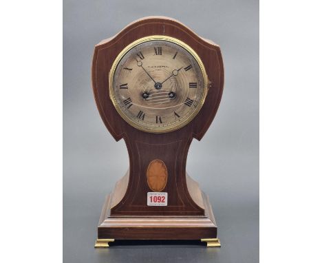 An Edwardian mahogany and inlaid balloon mantel clock,&nbsp;34.5cm high,&nbsp;with pendulum.