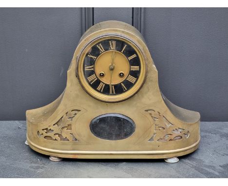 A late 19th century brass mantel clock,&nbsp;39cm wide, with pendulum.