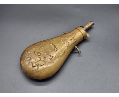 A 19th century US brass powder flask. 