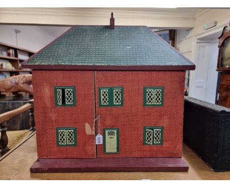 Doll's House:&nbsp;a vintage Triang doll's house, circa 1950s, complete with furniture, 70cm high x 61cm wide x 32cm deep.
