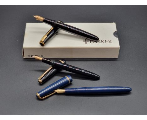 Four vintage Parker fountain pens, comprising: a 65, boxed; a blue Junior; a black Duofold; and a black Slimfold, each with 1