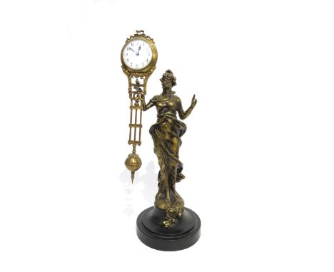 A Junghans figural form mystery timepiece, in form of a lady holding the clock aloft in her hands, on ebonised plinth, figure
