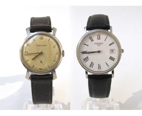 Two steel cased wristwatches on leather straps, one a Jaeger-LeCoultre and the other a Tissot. The Jaeger-LeCoultre with Arab