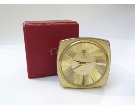 OMEGA: A circa 1960s Omega 8 days desk clock with date aperture, with Omega box