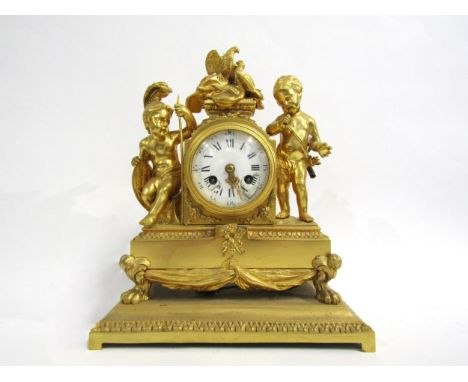 A 19th Century French ormolu/gilt metal mantel clock, the white enamel Roman numeral dial with outer Arabic track (dial a/f),