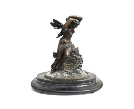 A large 19th Century French figural form bronze mantel clock depicting fairy by a bush, Roman numeral dial, the rack strike m