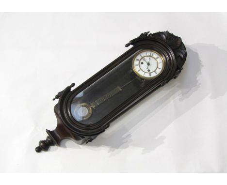 A ebonised wall hanging clock with white Roman numeral chapter ring, case having been painted black, movement striking a gong