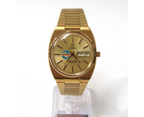 OMEGA: An Omega Seamaster Automatic gentleman's gold plated wristwatch with Omega clasp to bracelet, gilded dial with day/dat