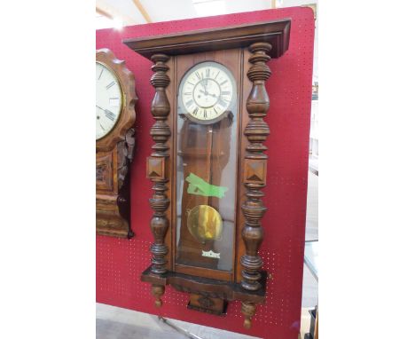 A Victorian era vienna style wall clock by Gustav Becker, the cream enamel dial with Roman numerals and a subsidiary dial, wi
