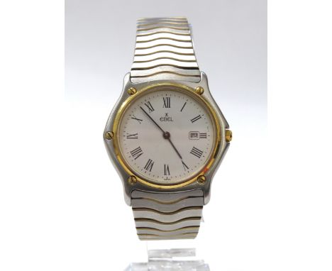 An Ebel Sport Classic wave bi-metal wristwatch, the steel strap with gilt detailing, white Roman numeral dial with date apert