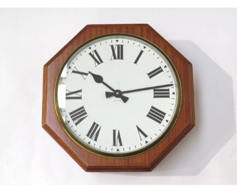 A contemporary British General Post Office (G.P.O.) double-sided octagonal form dial clock, white Roman numeral dials signed 