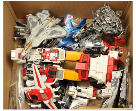 Quantity of loose Transformer figures and accessories including Starscream, Megatron, Silver Arrow, Thundercracker and others