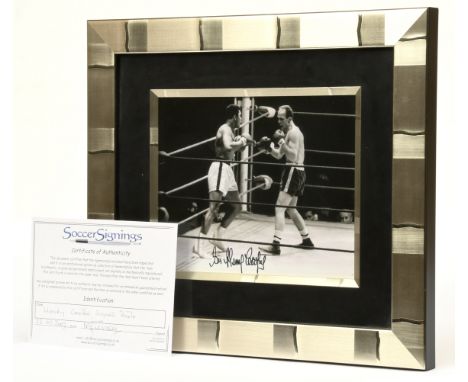 Henry Cooper autograph, on a photograph print of Henry Cooper vs Cassius Clay (Muhammed Ali), framed, with Certificate of Aut