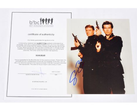 Sean Bean autograph, on a 10" x 8" photograph print of Sean Bean and Pierce Brosnan in "James Bond 007: Goldeneye", with Cert
