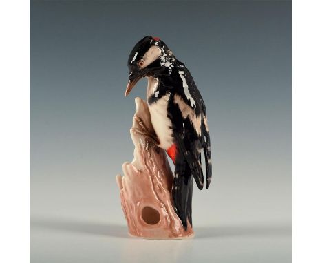 German animal figure, done in high color with deep glaze. Dimensions: 7.5"H X 2.5"D Manufacturer: W. Goebel Country of Origin