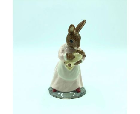 Mother bunny holding her newborn bunny. Hand painted light pink dress, red shoes and yellow blanket. Artist: Shane Ridge Issu