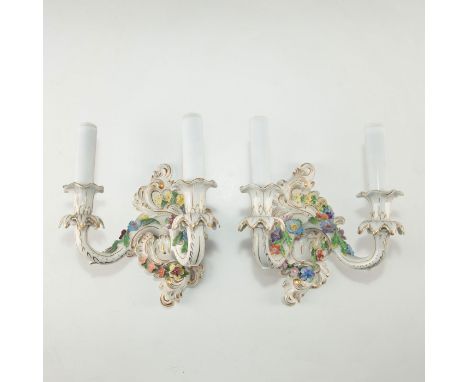 Wall mounted classic Dresden china with floral and gilt accents. Exquisite and delicate floral petals and buds, all hand pain