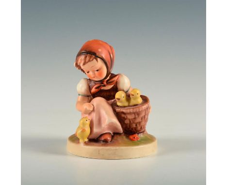 Figure of girl kneeling with three chicks. Base marked model number 57/0. W. Goebel&nbsp;backstamp. Artist: Reinhold Unger Is