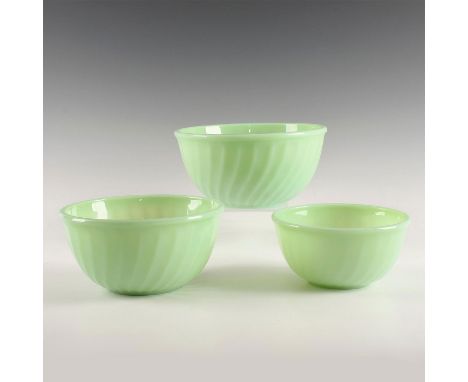 Lime green series of 3 nesting sizes, with subtly fluted exteriors. Vintage US make, oven safe. Dimensions: 8"D X 4"H, larges