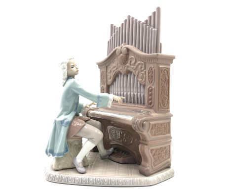 Boy playing piano - Lladro number 010011801. JUAN SEBASTIAN BACH S.L (with box). Artist: Joan Coderch Issued: 1994 Dimensions