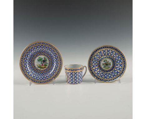 Teacup, saucer, and cake or sandwich plate. An elegant tea trio (teacup, saucer, cake plate) with blue enamel decorations of 
