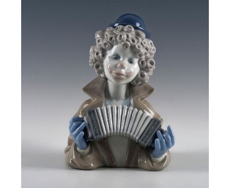 Clown playing an accordion - Lladro number 01005585. BUSTO PAYASITO CONCERTINA Artist: Francisco Catala Issued: 1989 Dimensio