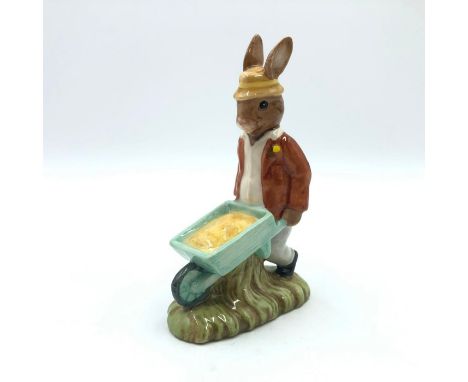 Bunny gardener with wheelbarrow. Hand painted brown jacket, white shirt, grey trousers and light green wheelbarrow. Artist: W