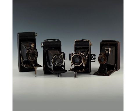 Black enamel, leather, and chrome abound- Kodak and Ihagee makes. Issued: 1900's Dimensions: 8"L X 3.5"D X 6.5"H Manufacturer