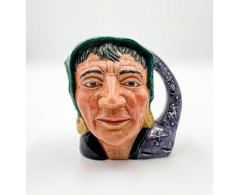 Green scarf around head; black shawl; purple handle. The Fortune Teller small jug features a purple signs of the zodiac handl