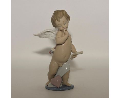 Cupid carrying his arrow - Lladro number 01006311. FLECHA DE AMOR (with box). Artist: Jose Puche Issued: 1996 Dimensions: 6.4
