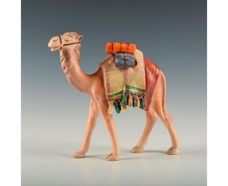 Large figure of a standing camel with colorful, decorated gear . Back of right leg incised with model number X306, dated 1960