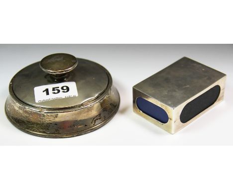 A hallmarked silver matchbox cover and a hallmarked silver rim and lid.