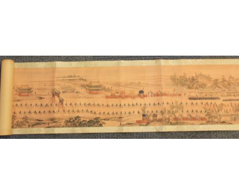 A silk mounted Chinese scroll of "The Imperial Progress", W. 32cm.