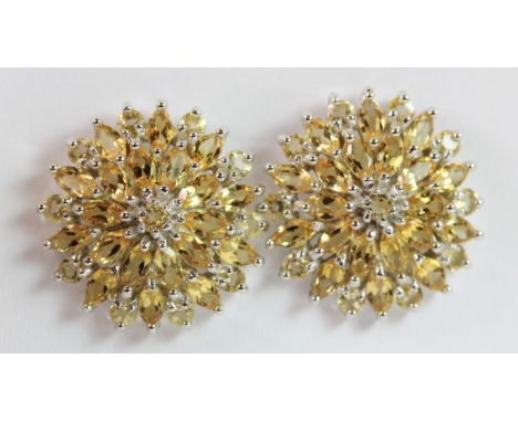 A pair of 925 silver flower shaped earrings set with citrines and cubic zirconias.