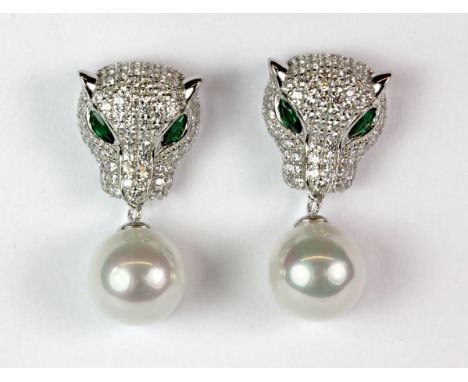 A pair of 925 silver Cartier style panther earrings set with stones and faux pearls.