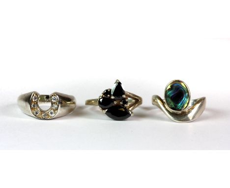 Three 925 silver stone set rings.