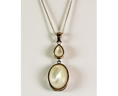 A white metal (tested silver) opal set pendant on a 925 silver chain.