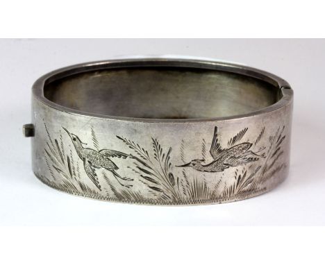 A white metal (tested silver) Charles Horner bangle.