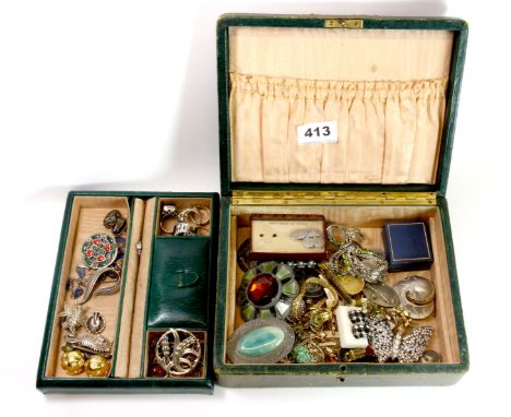 A vintage leather jewellery box and contents including silver.