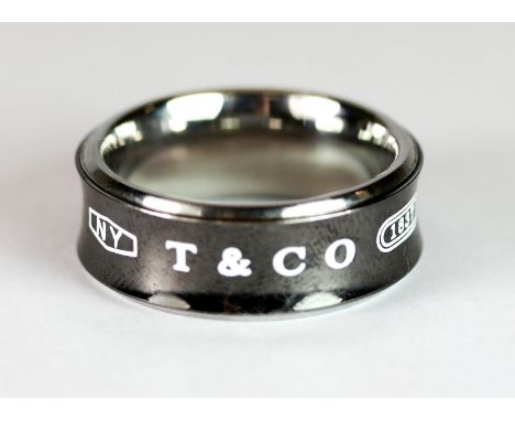 A black and white titanium gentleman's Tiffany & Co ring (U).
