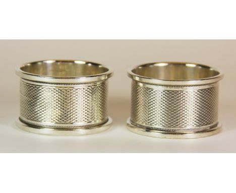 Two hallmarked silver napkin rings.