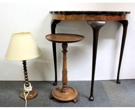 A walnut veneered console table, mahogany wine table and a barley twist table lamp.