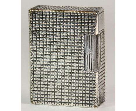 A French vintage Dupont lighter.