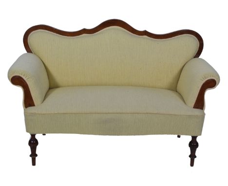 Walnut framed sofa, back with scroll outline and scrolled arms, on turned supports with striped pale straw coloured upholster